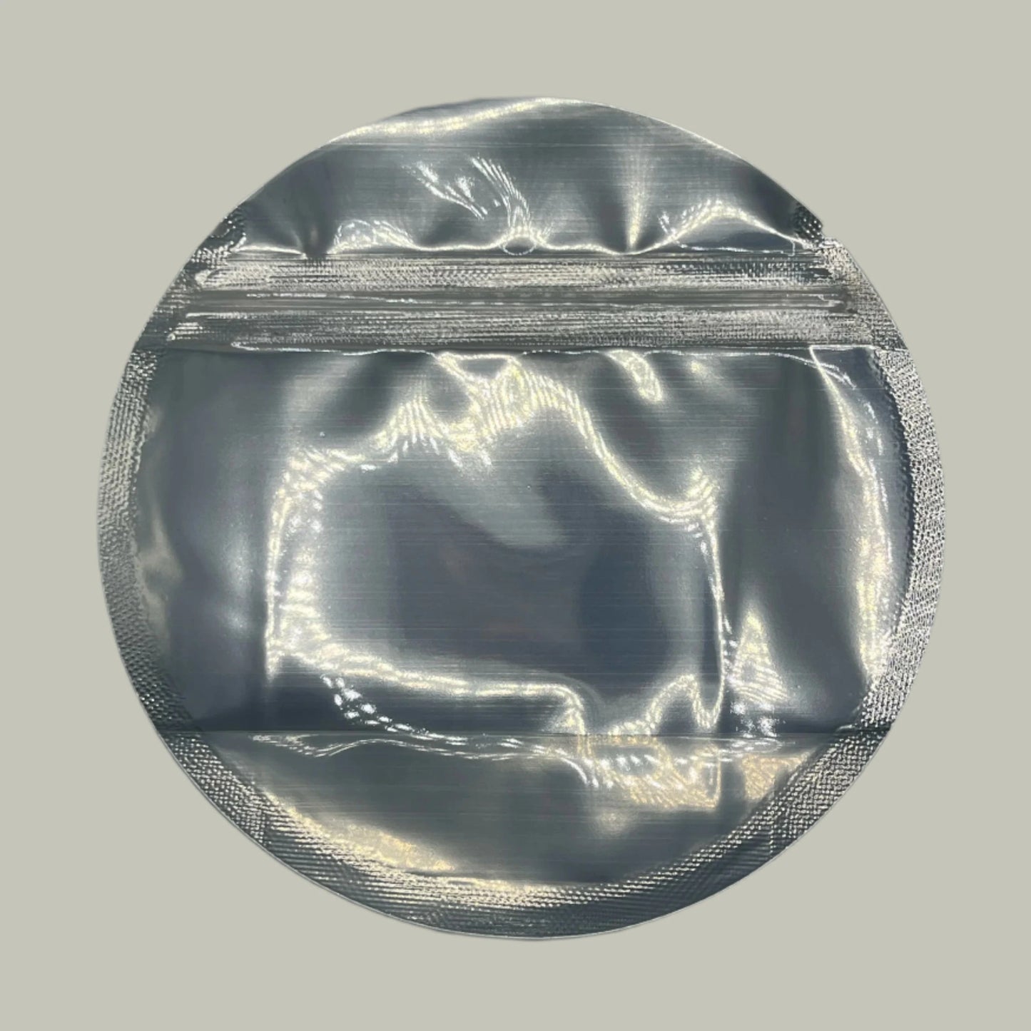 Silver round mylar bag on a white background