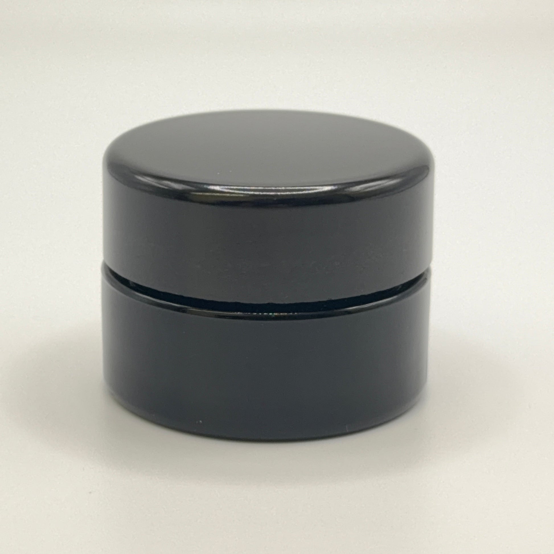 10 milliliter Miron UV glass jar on a white background.