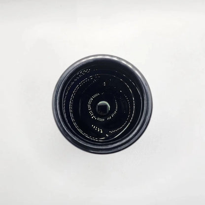 Black glass jar on a white background