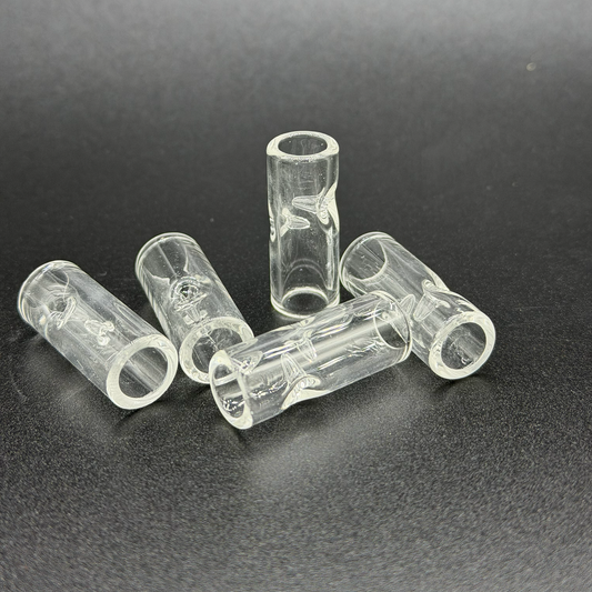 Clear plastic tubes with two pinches on a dark background