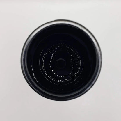 Close-up of a black glass jar