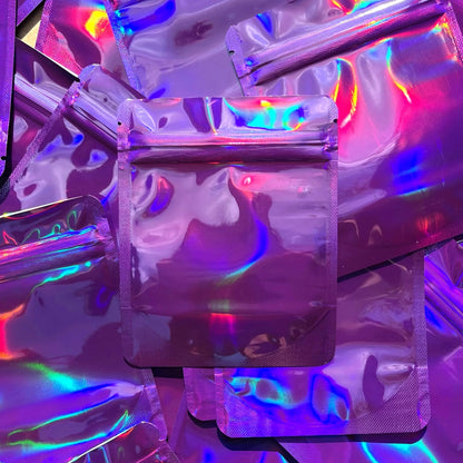 GD Purple Holographic 4x5 mylar bag on top of mylar