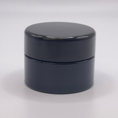 15 milliliter Miron UV glass jar on a white background