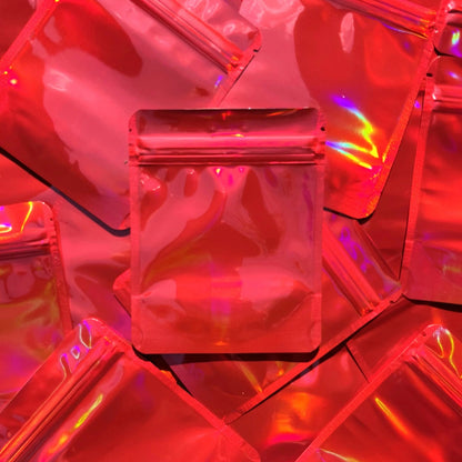 Cherry Red Holographic 4x5 mylar bag on top of mylar