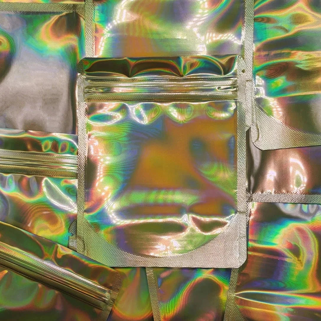 Gold Holographic 4x5 mylar bag on top of mylar bags
