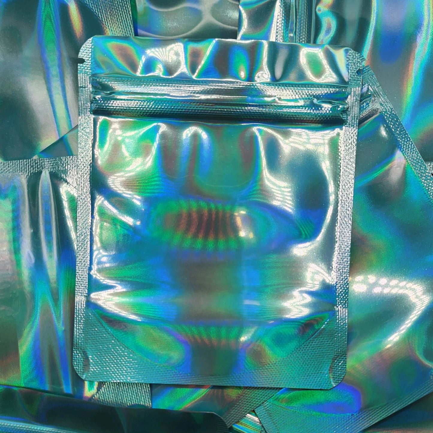 Jewelry Box Blue Holographic mylar bag on top of mylar bags