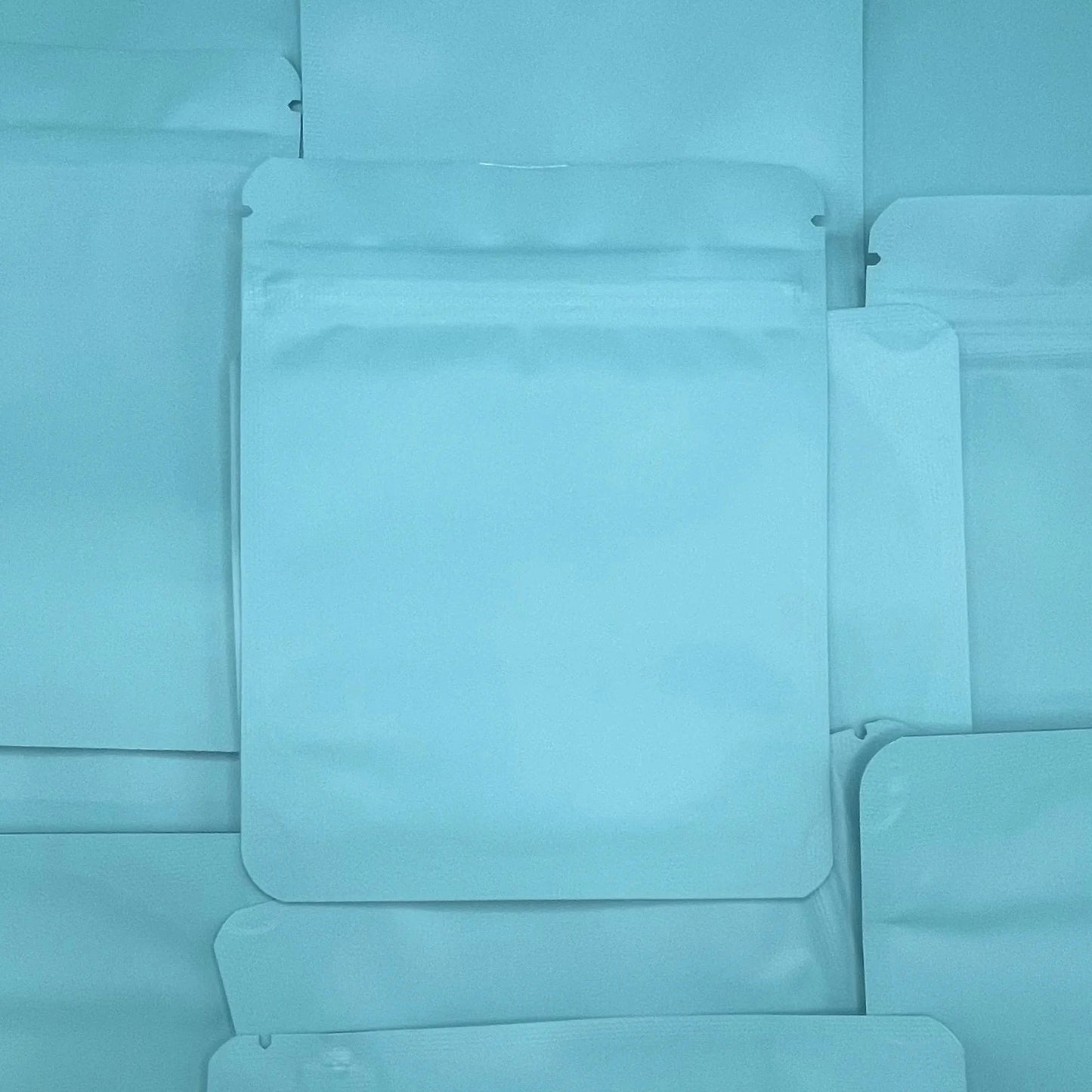 Jewelry Box Blue 4x5 mylar bag on top of mylar bags