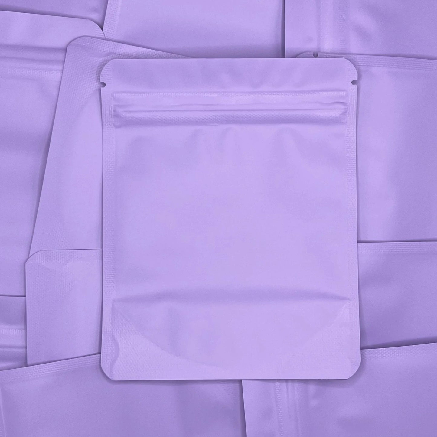 Lilac Lavender 4x5 mylar bag on top of mylar bags