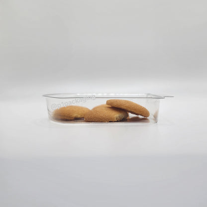 Clear plastic container with cookies on a white background