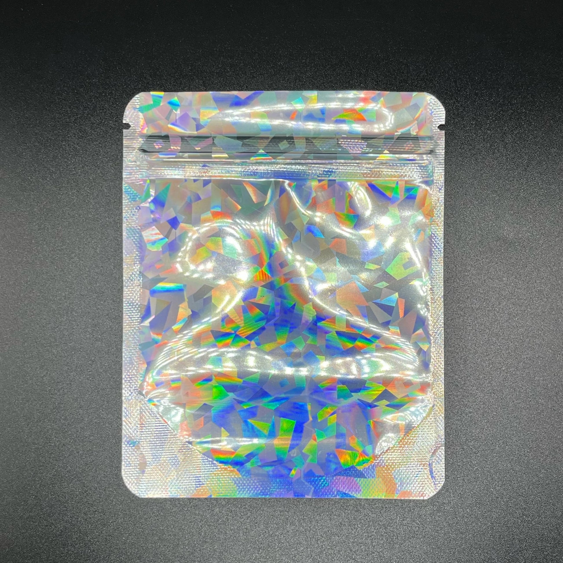 Prismatic holographic 4x5 mylar bag on a black background