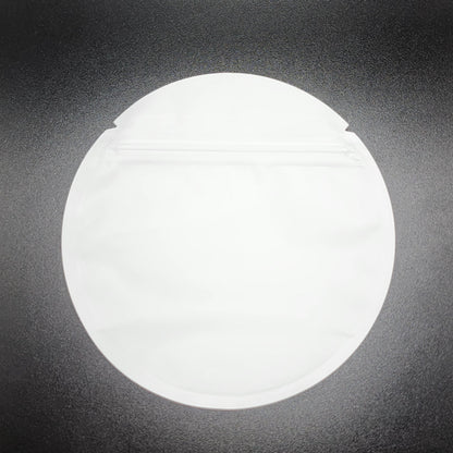 White circle mylar bag on a black background
