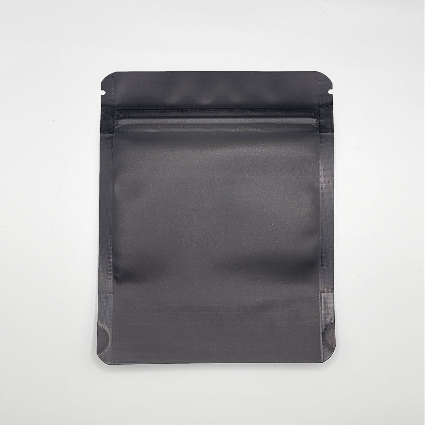 Black 4x5 mylar bag on a white background