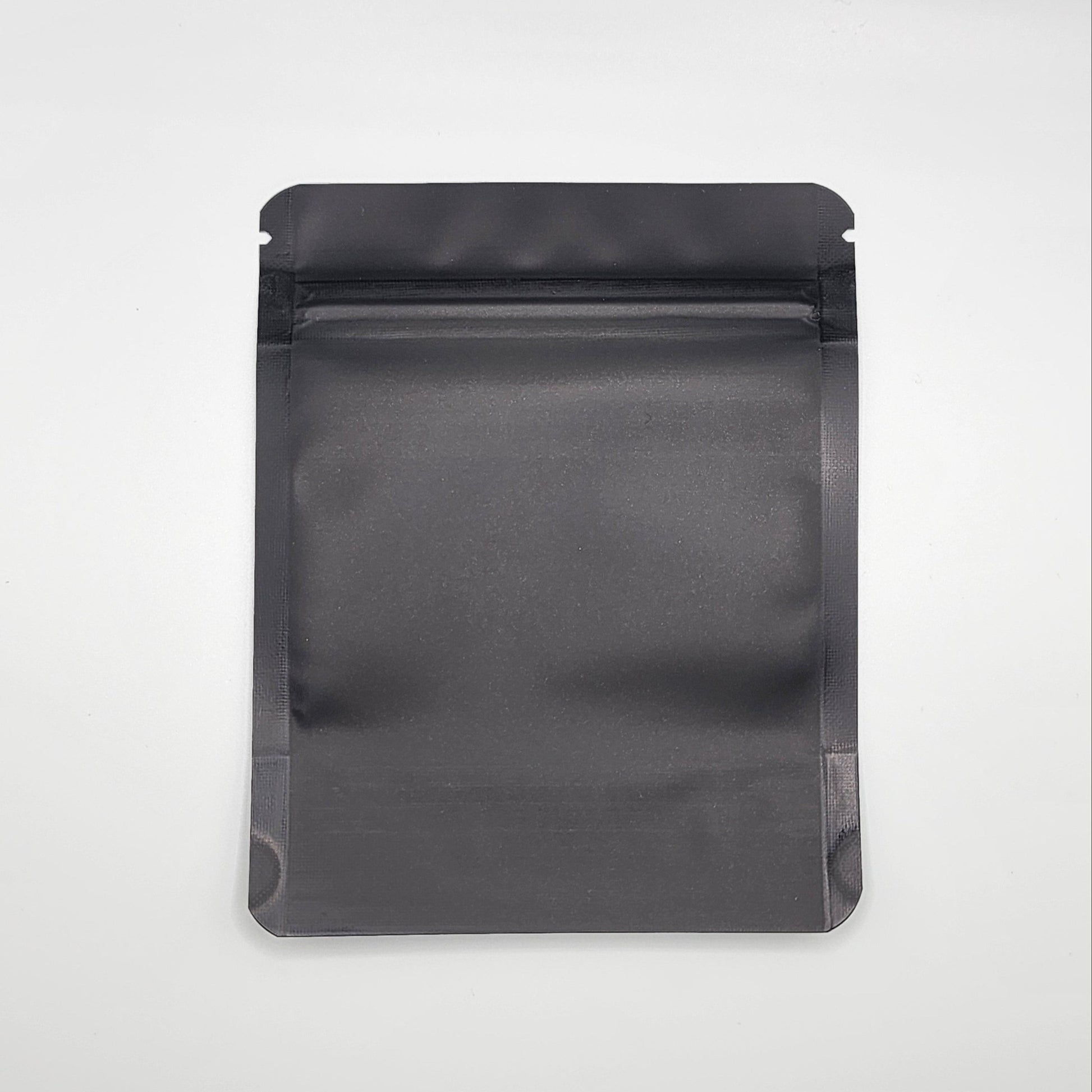 Black 4x5 mylar bag on a white background