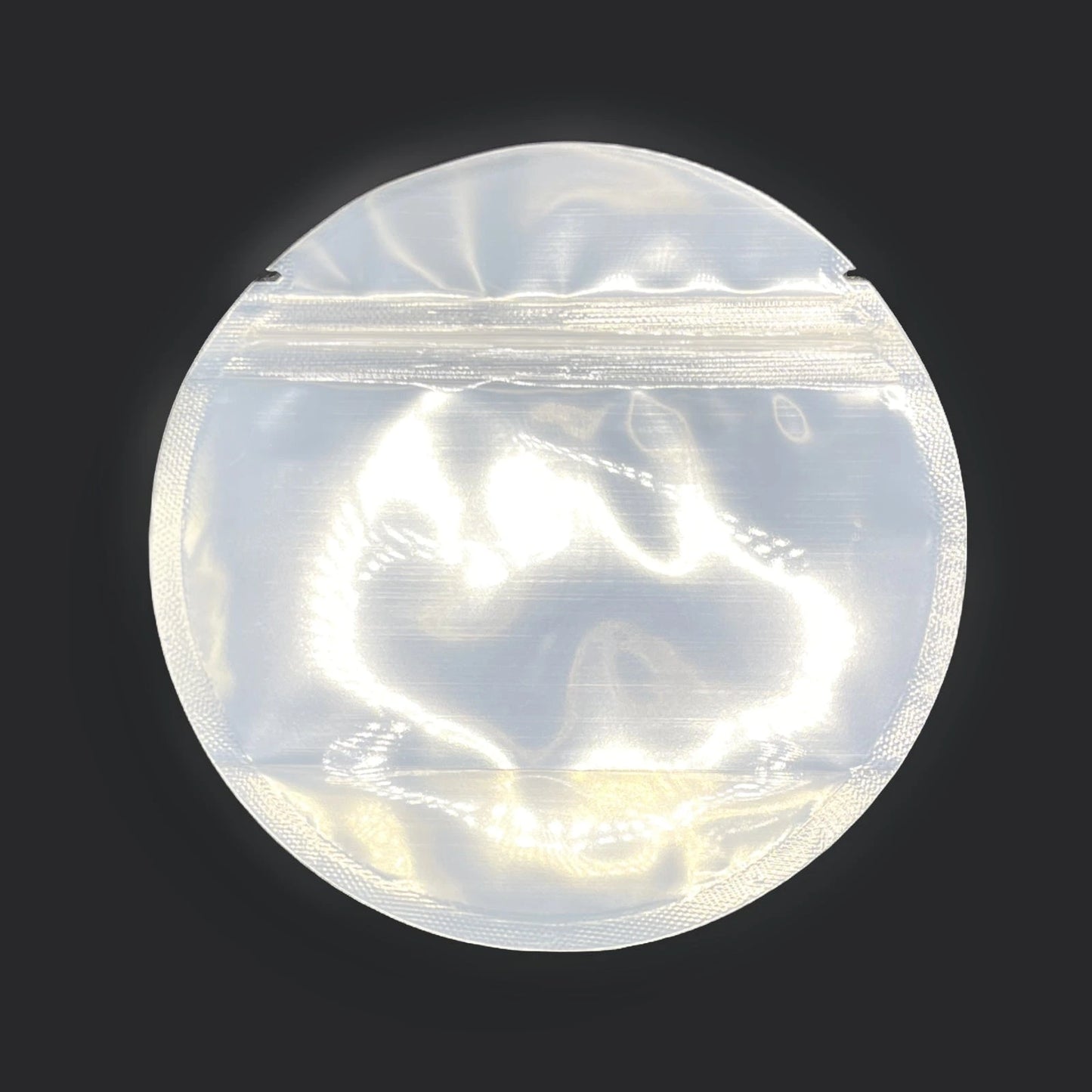 Circle mylar bag on a black background