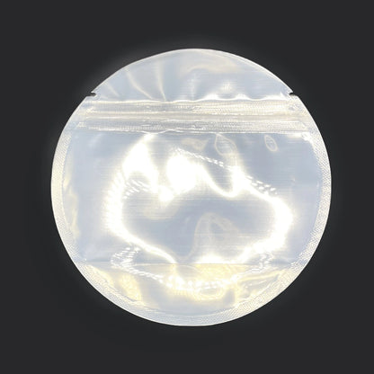 Circle mylar bag on a black background