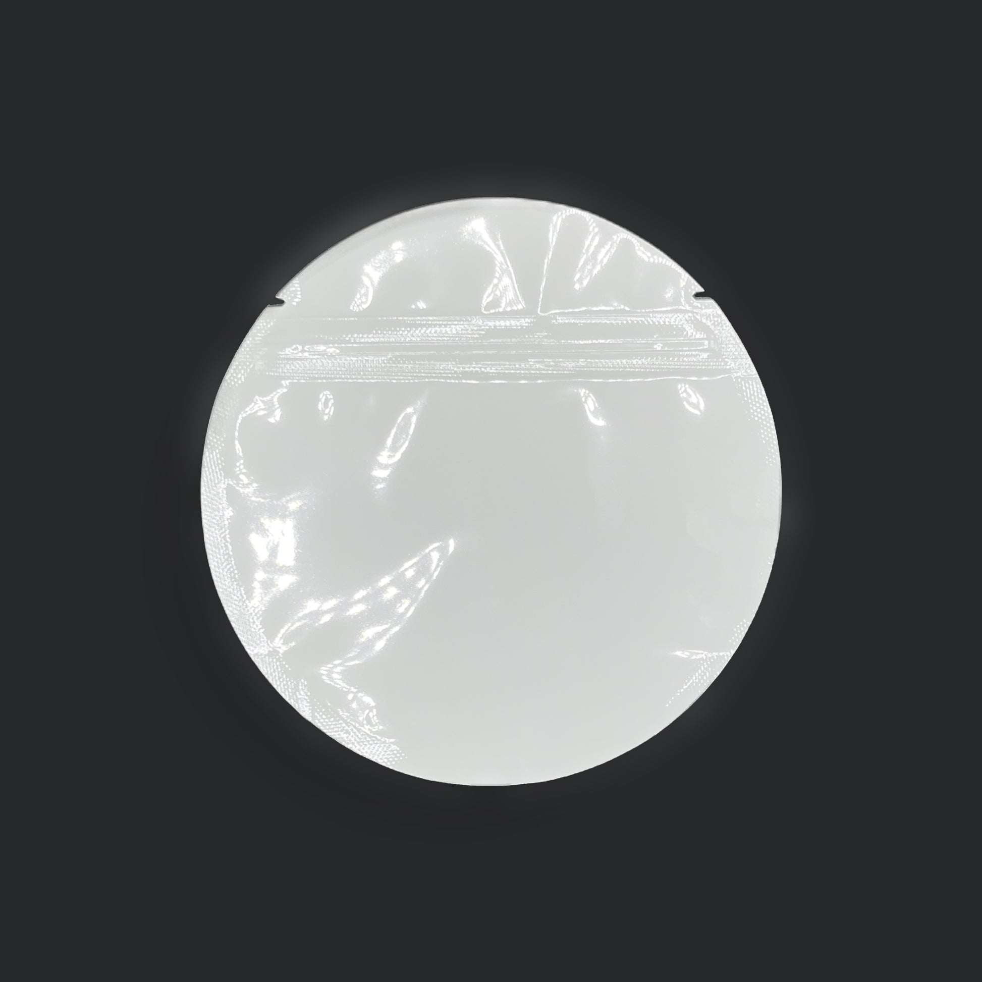 White circle mylar bag on a black background
