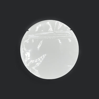 White circle mylar bag on a black background