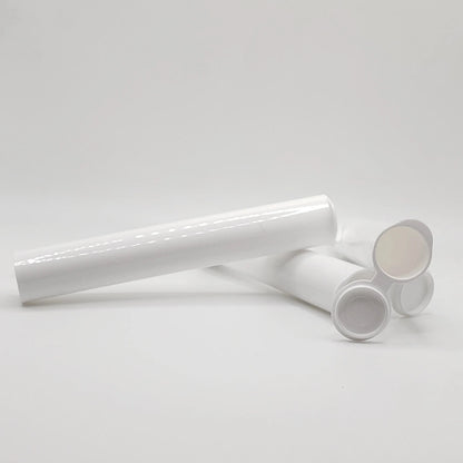 White cylindrical objects on a light gray background
